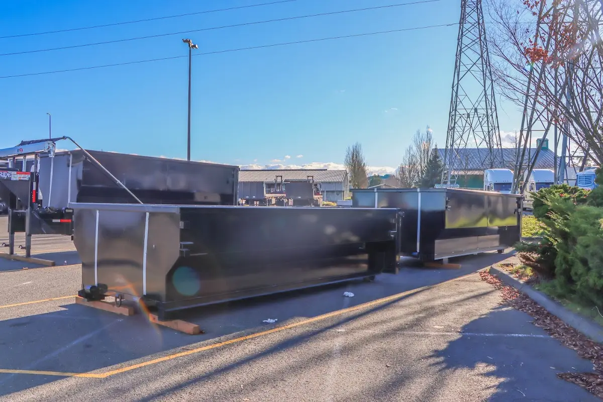 Roll-off dumpster ready for waste disposal at job site for 6 Yard Dumpster Rental in Tomball